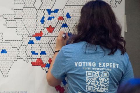 College student filling in election map