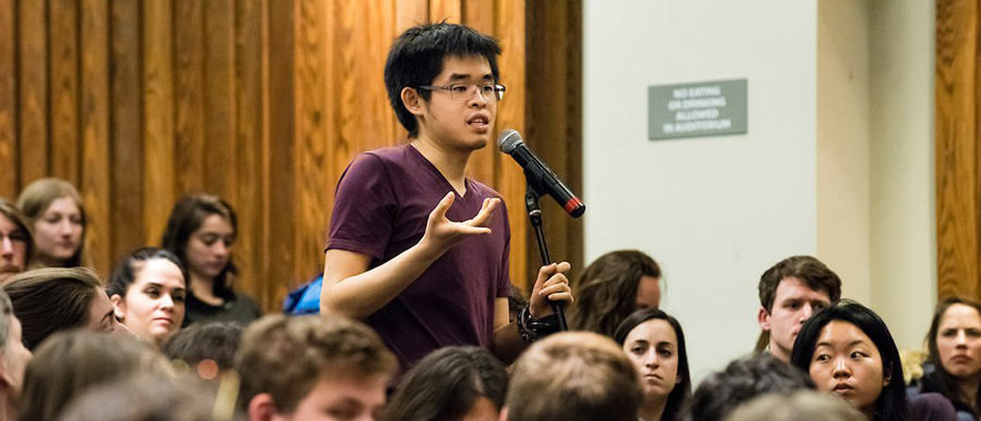 Young people speaking at an event